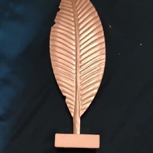 Elegant Gold Leaf Sculpture